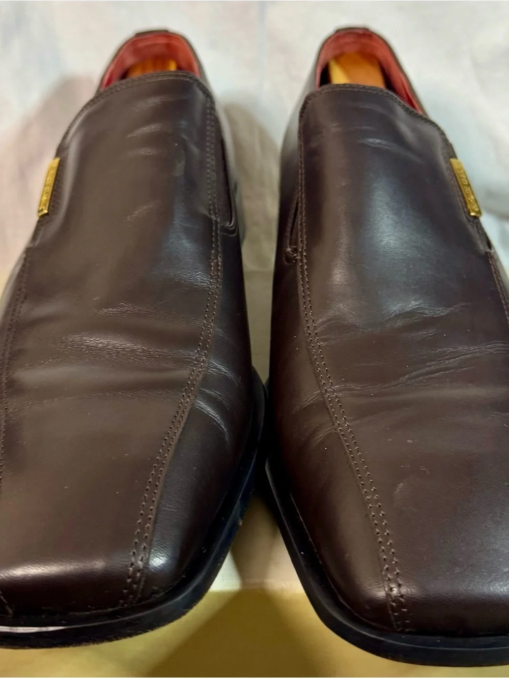 Versace Classic Men's Dark Brown Leather Slip-Ons with Gold Plaque